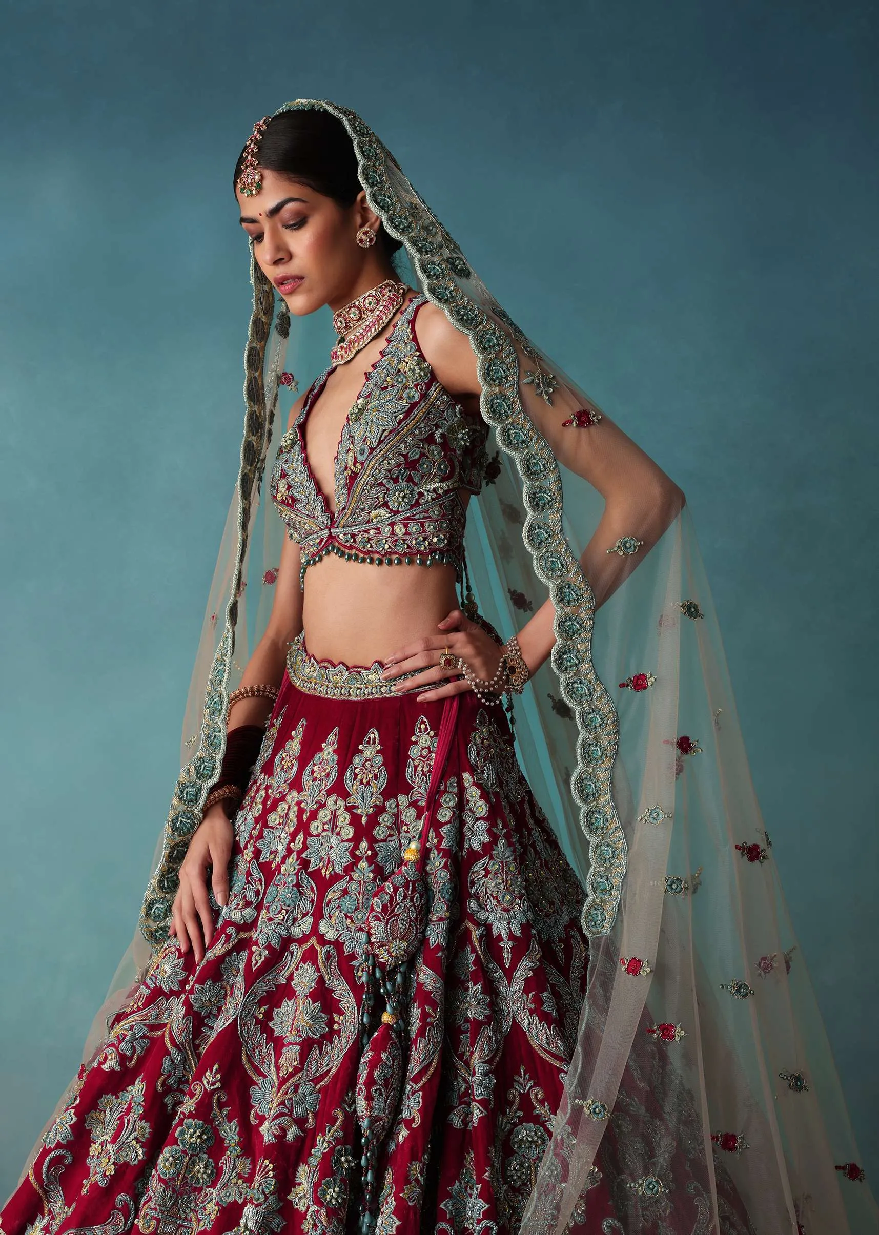 Deep Red Hand Embroidered Bridal Lehenga And blouse Set In Velvet
