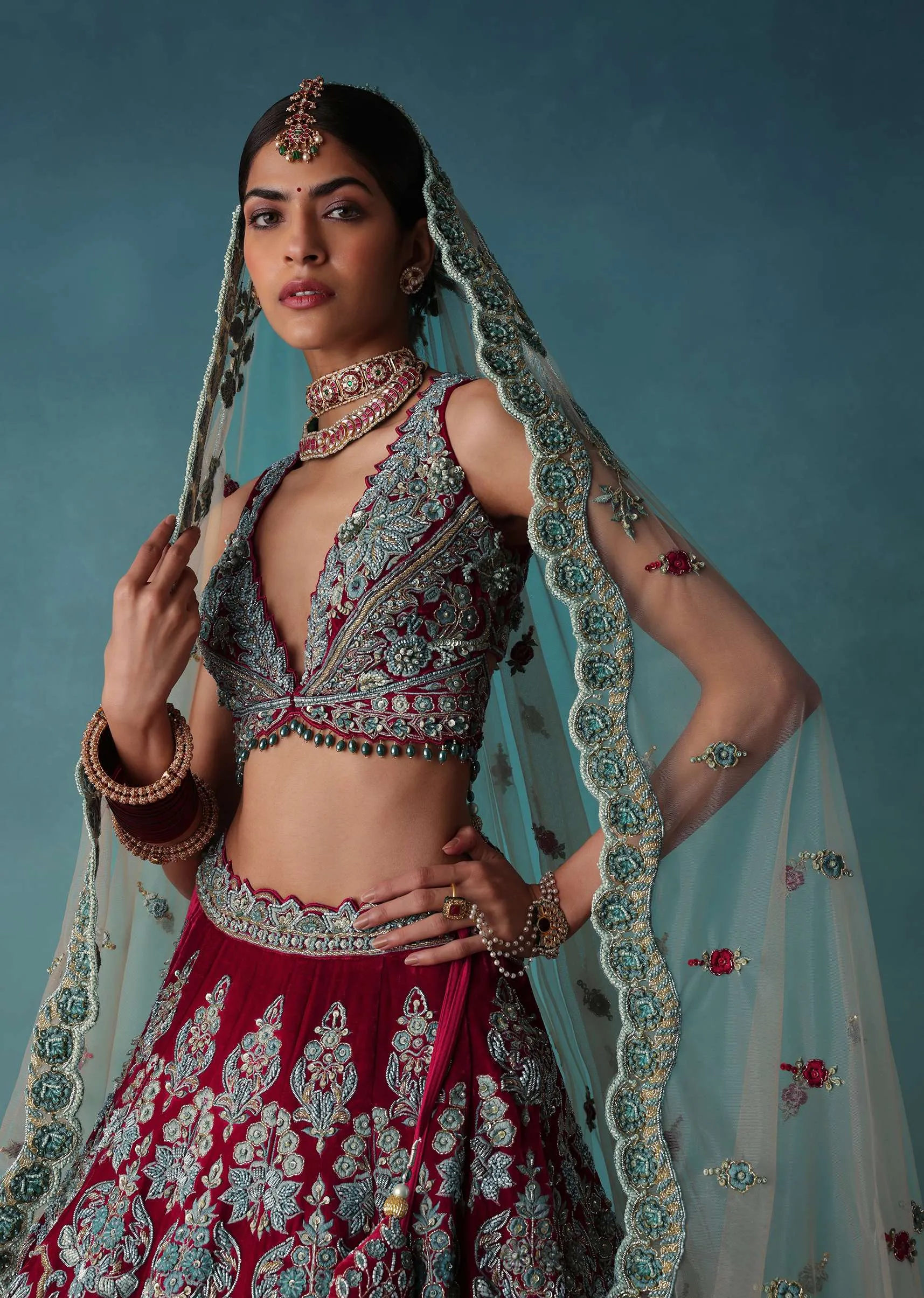 Deep Red Hand Embroidered Bridal Lehenga And blouse Set In Velvet