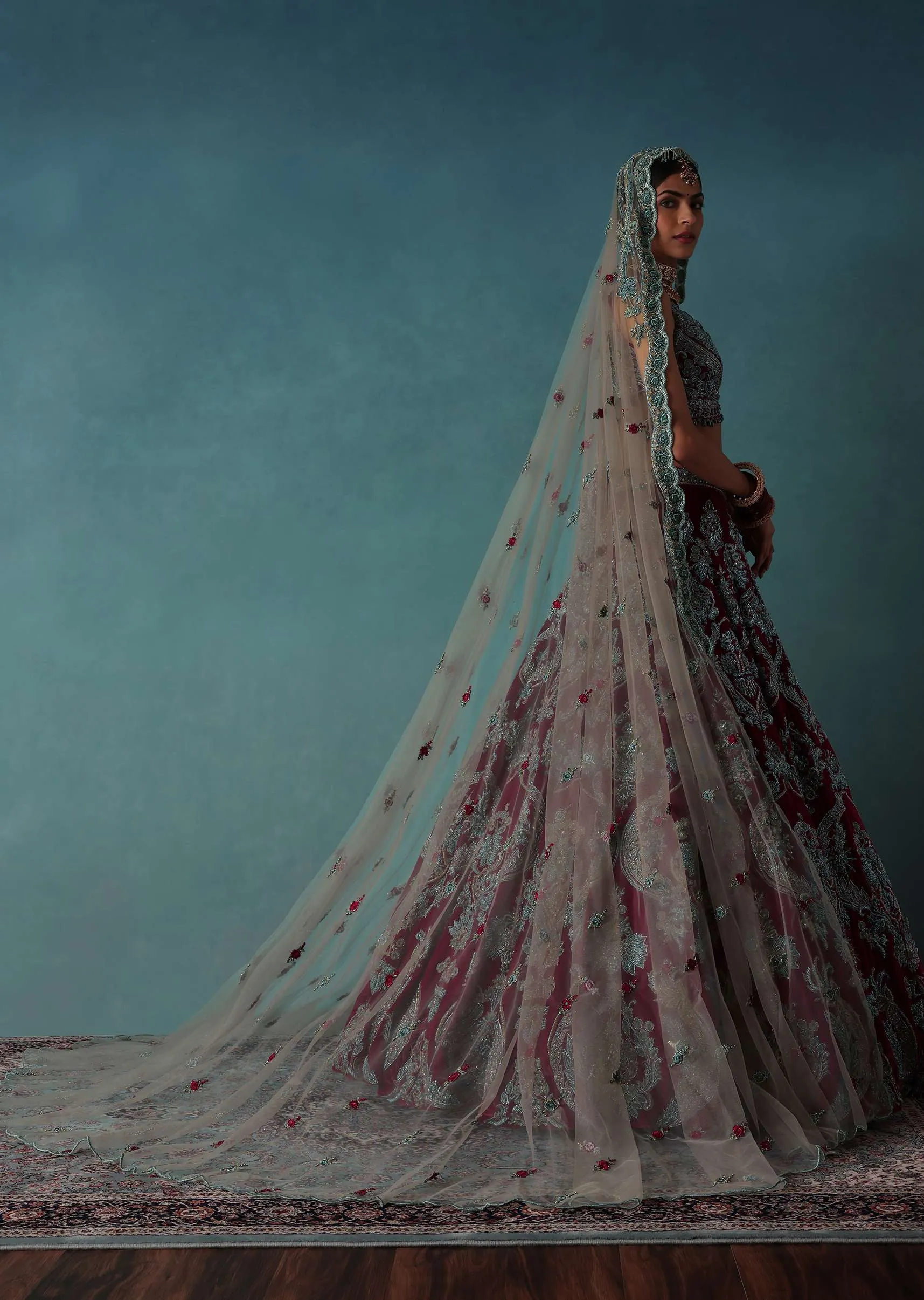 Deep Red Hand Embroidered Bridal Lehenga And blouse Set In Velvet